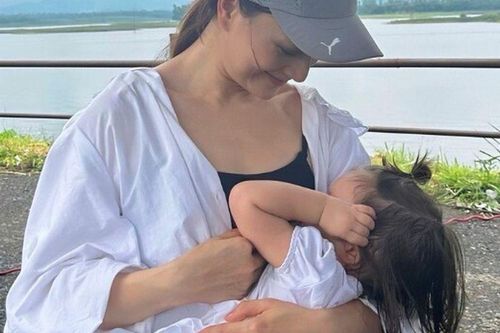Ái nữ lai Tây nhà Lan Phương hơn 1 tuổi vẫn thèm sữa mẹ, nữ diễn viên bế con cho bú giữa đoàn phim