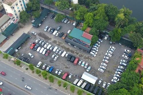 Hà Nội: Hơn một thập kỷ 'đắp chiếu', đất vàng quy hoạch công viên thành bãi xe không phép quy mô lớn