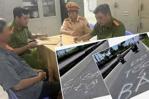 Xử phạt người đàn ông vẽ chữ 'có bắn tốc độ' trên mặt đường