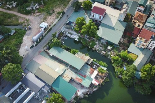 Cận cảnh hồ 25.000m2 ở Hà Nội bị lấn chiếm, xây dựng trái phép