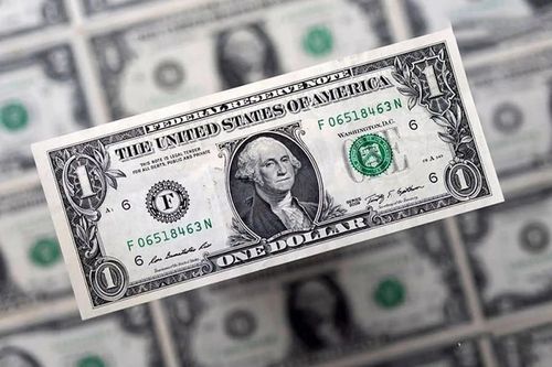 Đồng USD tăng trở lại sau loạt biến động bất ngờ từ Fed và Nhà Trắng