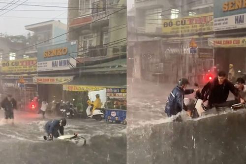 'Sốt' clip 3 thanh niên lao ra cứu chiếc xe máy bị mưa lớn cuốn trôi ở TP.HCM