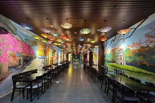 Vẽ tranh tường nhà hàng độc đáo cùng thương hiệu Bút Thần