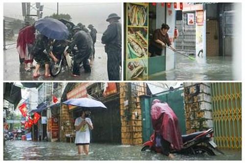 Hà Nội: Người dân 'vật lộn' với ngập sâu sau mưa lớn do bão số 5
