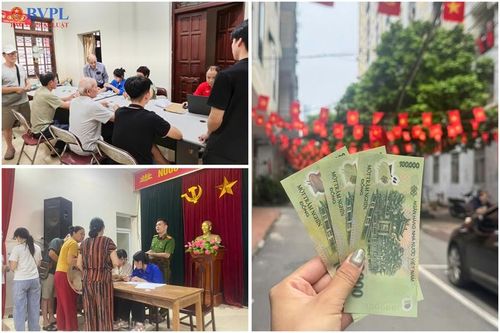 Người dân phấn khởi nhận quà mừng Quốc khánh 2/9
