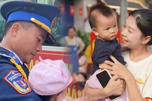 Vợ bế con 9 tháng tuổi chờ chồng diễu binh, giây phút gặp mặt vỡ òa hạnh phúc