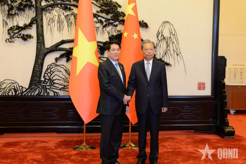 Chủ tịch nước Lương Cường hội kiến Ủy viên trưởng Nhân đại toàn quốc Trung Quốc Triệu Lạc Tế