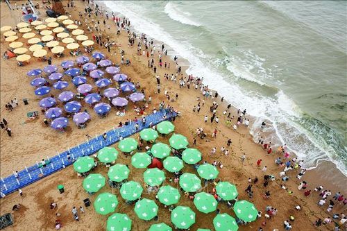 Mưa dài kỷ lục và nắng nóng đỉnh điểm tấn công đồng thời Trung Quốc
