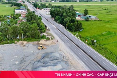 Tiềm ẩn mất ATGT từ các bãi tập kết vật liệu xây dựng bên Quốc lộ 1