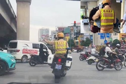 Hà Nội: CSGT mở đường 8 km, bế người phụ nữ bị co giật vào viện kịp thời