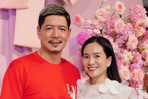 Siêu mẫu Bình Minh lộ diện kém sắc bên vợ, sự thật đằng sau gây chú ý
