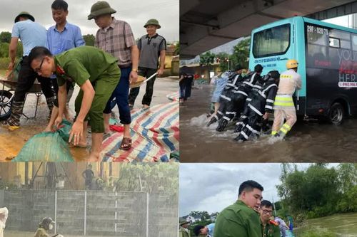 Lực lượng Công an Hà Nội dầm mưa cùng Nhân dân phòng chống bão lũ