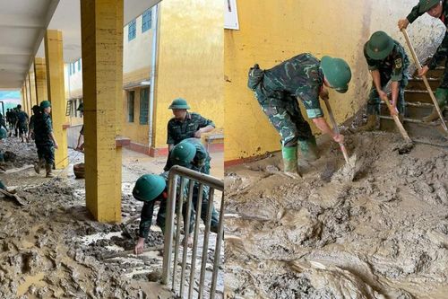 Bộ đội dầm mình trong bùn đất giúp dân sau đợt mưa lũ lớn