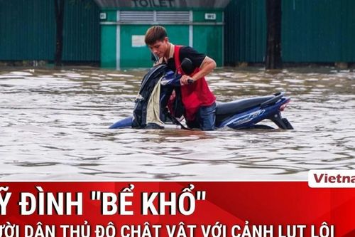 Ùn tắc kéo dài tại Mỹ Đình, người dân chật vật di chuyển vì lụt lội