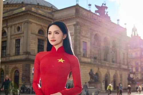 Hương Giang khoe sắc với áo dài đỏ, fan rần rần trước thềm Miss Universe