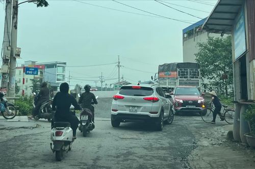 Đường H14 và cầu Cần Kiệm chậm tiến độ
