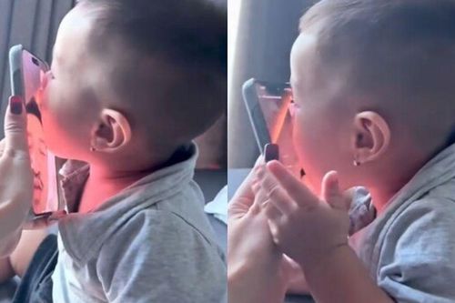Bạn gái Quang Minh khoe cảnh con hôn tới tấp vào điện thoại khi bố đi làm xa, quý tử bé xíu đã sống tình cảm
