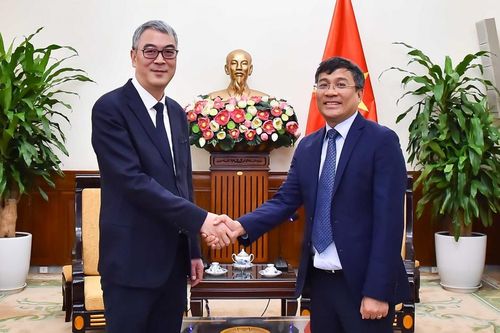 Thứ trưởng Thường trực Nguyễn Minh Vũ tiếp Phó Thị trưởng Trùng Khánh Từ Kiến