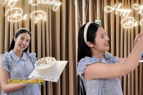 Hoa hậu Ngọc Hân bế con tổ chức sinh nhật cho chồng, quý tử 1 tháng tuổi hưởng gen mũi cao của bố