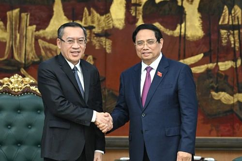 Thủ tướng Phạm Minh Chính tiếp Bộ trưởng Lao động và Phúc lợi Lào Phosay Sayasone
