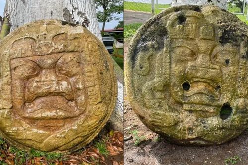 Hai tấm bia tròn khắc họa khuôn mặt người kinh dị