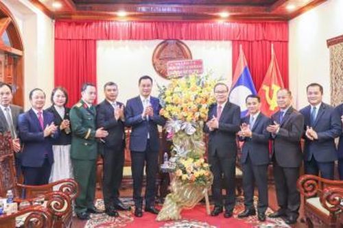 Bí thư Thành ủy Lê Ngọc Quang chúc mừng Quốc khánh nước Cộng hòa Dân chủ Nhân dân Lào