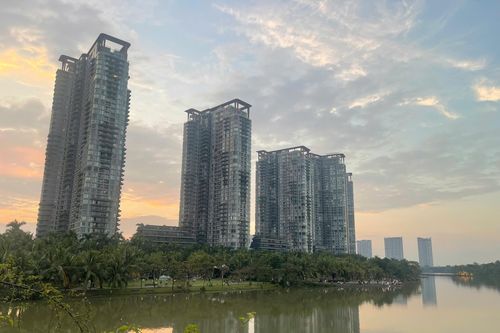 Kìm đà tăng giá bất động sản