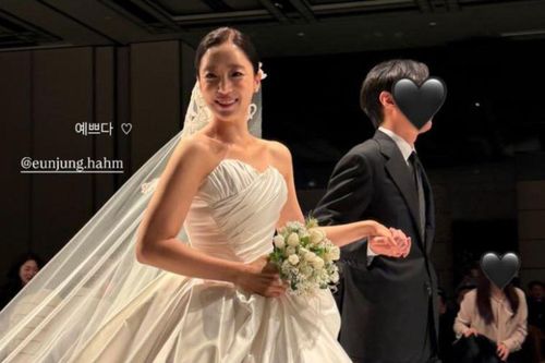 Nữ ca sĩ đình đám mặc váy cưới đẹp phát sáng, cười tươi rói khi đi lấy chồng
