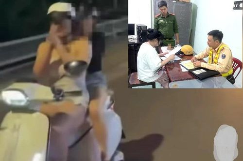 Triệu tập cô gái chạy xe máy như diễn viên xiếc trên đường ở TPHCM