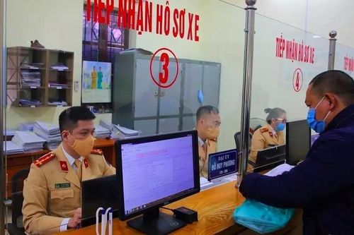 Đăng ký biển số ô tô tại Hà Nội, TPHCM: Bộ muốn giảm còn 14 triệu đồng/xe