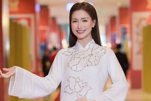 Hòa Minzy nền nã trong thiết kế áo dài trắng hiện đại