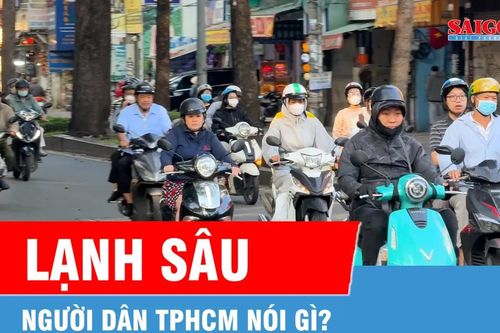 Người dân TPHCM 'co ro' trong đợt lạnh hiếm gặp