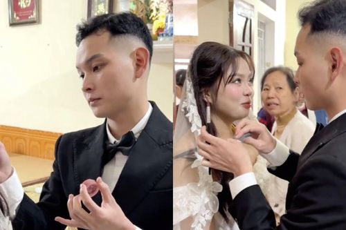Cảnh chú rể tự tay trang điểm cho vợ trong ngày cưới khiến dân mạng 'tan chảy'