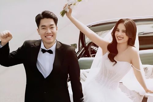 'Hot girl bắn cung' tung ảnh cưới với VĐV cầu lông Việt