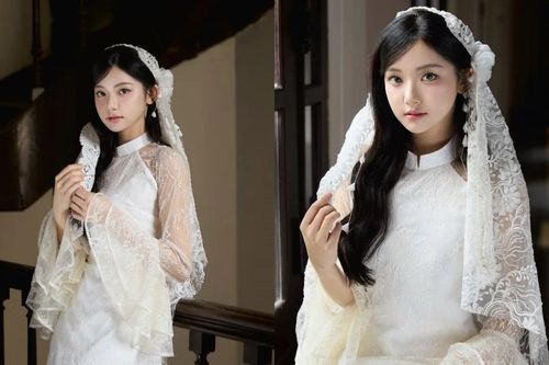 Hot girl TikTok Quỳnh Trương diện áo dài và khăn voan tựa nàng thơ