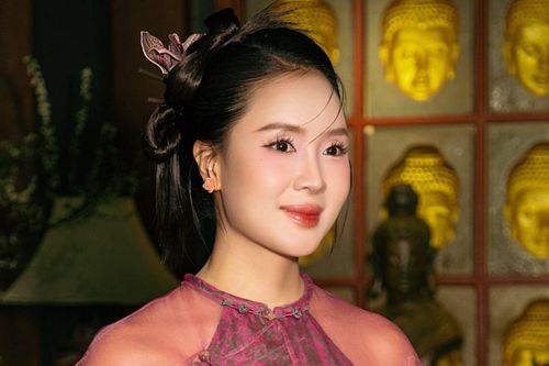 Những lần diện áo dài gây thương nhớ của Hồng Diễm