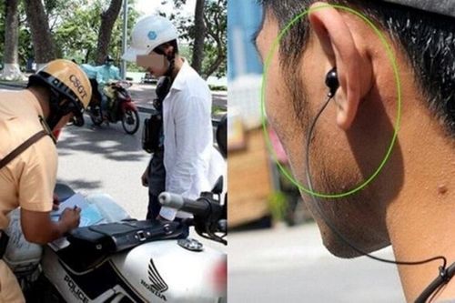 Đeo tai nghe, sử dụng điện thoại khi đi xe máy có thể bị phạt đến 14 triệu đồng