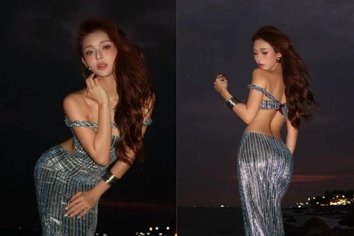 Hot girl Hoàng Yến diện váy cắt xẻ khoe dáng 'đồng hồ cát' trên biển đêm