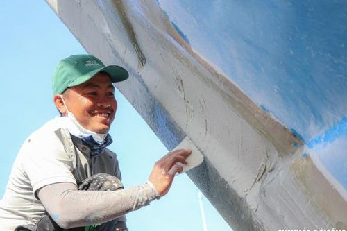 Nụ cười cần lao ngày cuối năm đẹp đến nao lòng