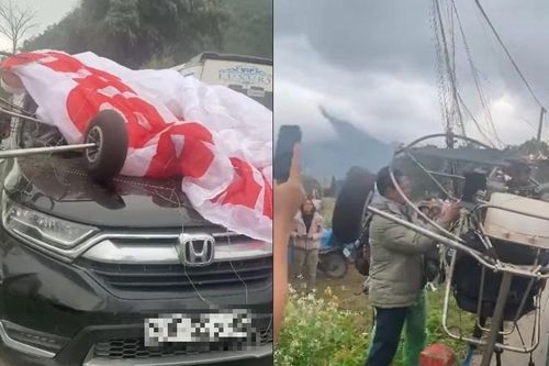 Dù lượn rơi vướng dây cáp rồi va chạm ô tô lưu thông trên đường ở Tuyên Quang