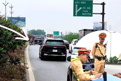 Xử lý nghiêm xe máy đi ngược chiều trên quốc lộ 18 sau phản ánh của Báo Xây dựng