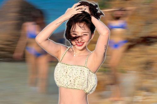 Tóc Tiên thả dáng với đồ bơi hai mảnh, tự tin khoe vòng eo nổi rõ múi cơ