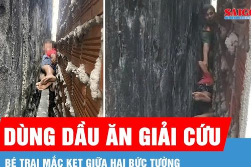 Dùng dầu ăn giải cứu bé trai mắc kẹt giữa hai bức tường