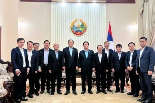 VRG đề xuất mở rộng đầu tư 50.000ha cao-su tại Lào trong chuyến thăm, chúc Tết Bunpimay