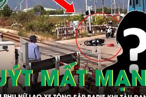 'Thót tim' khoảnh khắc người phụ nữ lao xe vào rào chắn đường sắt khi tàu đang đến gần, suýt mất mạng