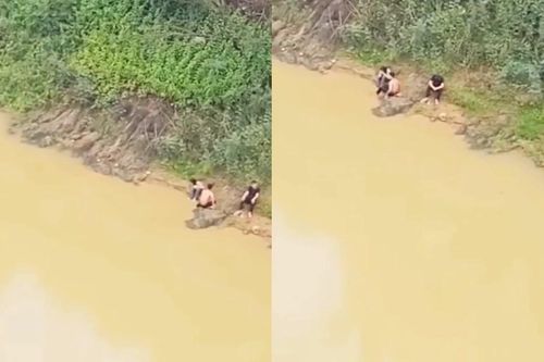 Video hai nam sinh lao xuống sông cứu nữ sinh lớp 11 nhảy cầu ở Nghệ An
