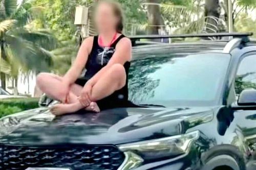 Xác minh clip nữ du khách ngồi vắt vẻo trên capo ô tô đang chạy ở Nha Trang