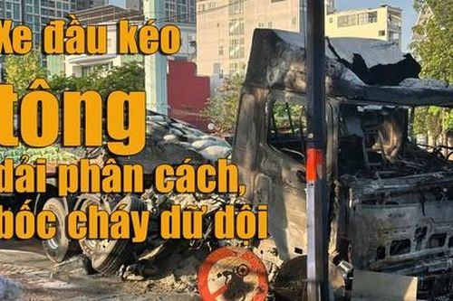 Clip xe đầu kéo tông dải phân cách, bốc cháy dữ dội ở TPHCM