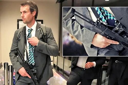 Súng MP7 bất ngờ gây bão khi xuất hiện trong tay đặc vụ mặc vest lịch lãm