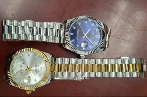 Khám kho hàng, phát hiện lượng lớn sản phẩm giả mạo nhãn hiệu đồng hồ Rolex, mũ thời trang Chanel, Louis Vuitton của Công ty Sơn Hà